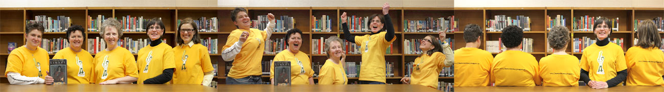 Library Staff wearing mascot tee